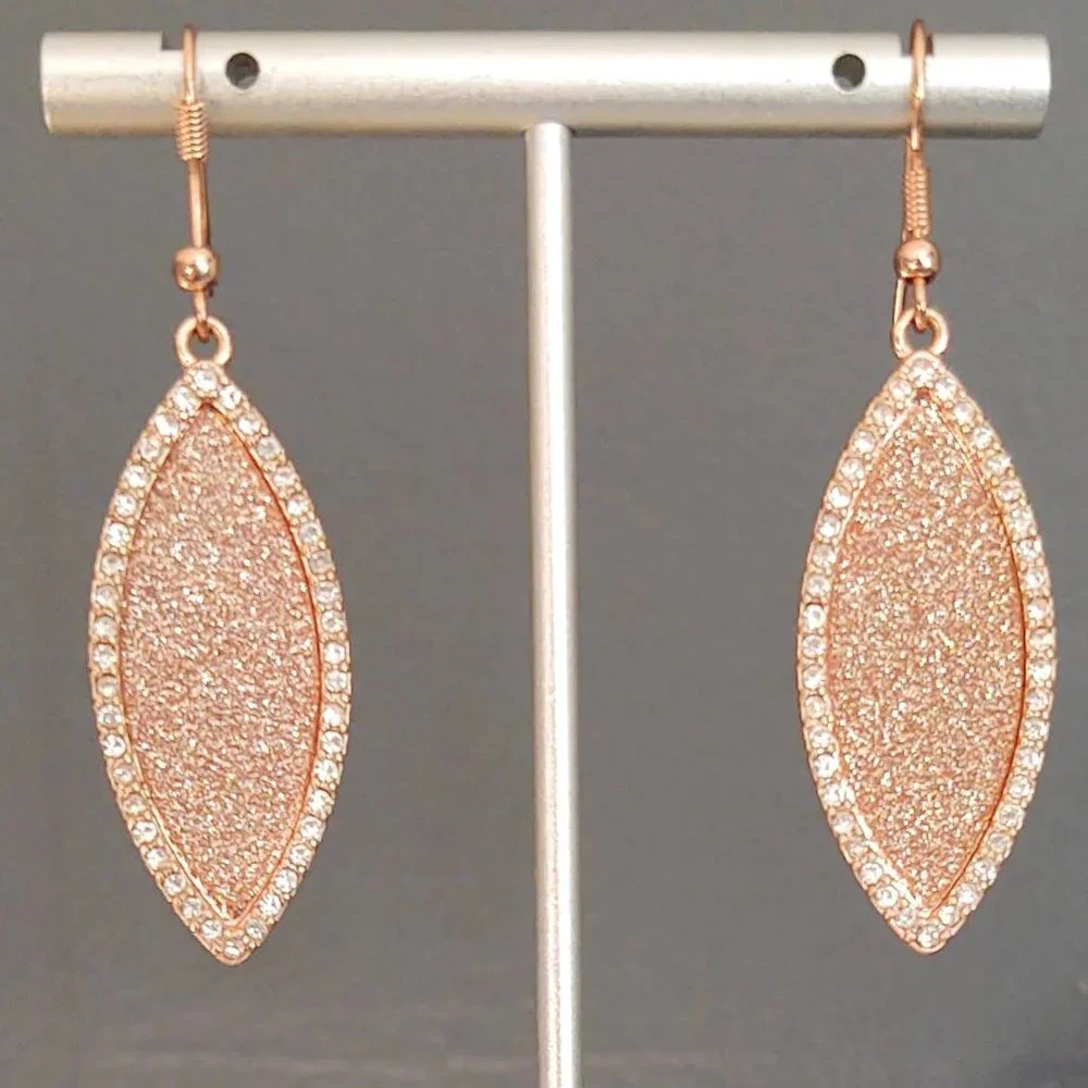 Sparkly rose gold dangle earrings with cz accents
